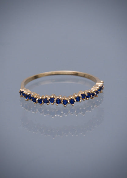 Anillo con swarovski azul 1.1gr / Talla: 7 / Oro Amarillo Nac B
