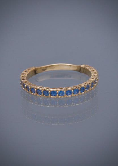 Anillo corazones con swarovski azul 2.2gr / Talla: 7 / Oro Amarillo Nac B