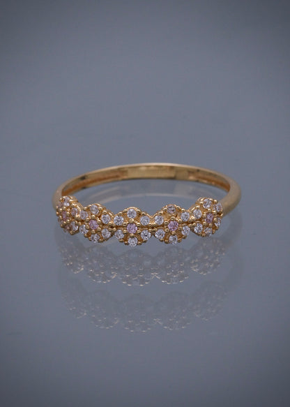 Anillo flores con swarovski rosado y blanco 1.6gr / Talla: 7 1/2 / Oro Amarillo Nac B