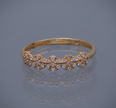 Anillo flores con swarovski rosado y blanco 1.6gr / Talla: 7 1/2 / Oro Amarillo Nac B