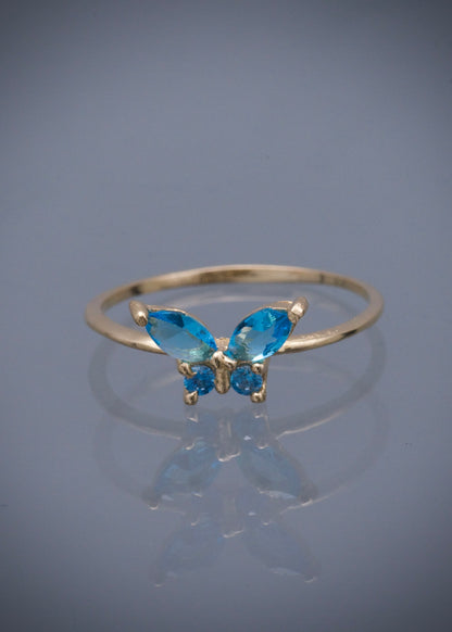 Anillo mariposa con swarovski azul 1.35gr / Talla: 7 / Oro Amarillo Nac B