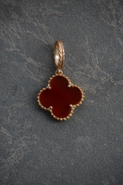 Dije lucky clover piedra roja 1.95gr / 2.3cm / Oro Rosado Nac B