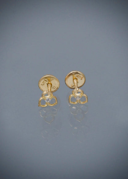 Topos flor con swarovski blanco 0.6gr / Largo 0.5cm / Oro Amarillo Nac B