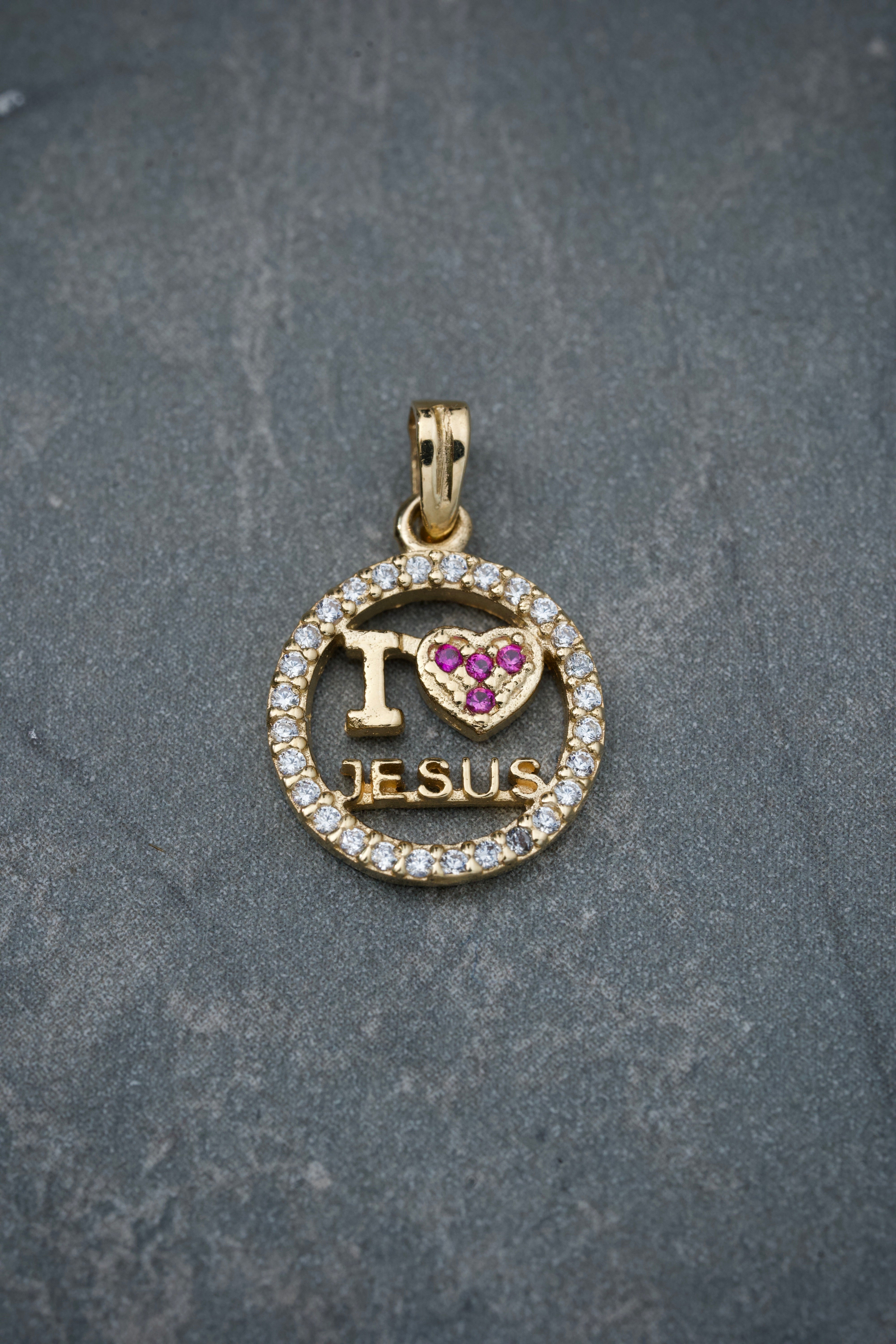 Dije jesus con swarovski blanco y rosado 1.2gr / 1.5cm / Oro Amarillo Nac B