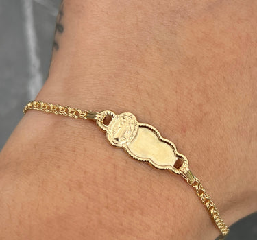 Pulso bebe con placa san benito 1.35gr / Largo 13.5cm / Oro Amarillo Nac M