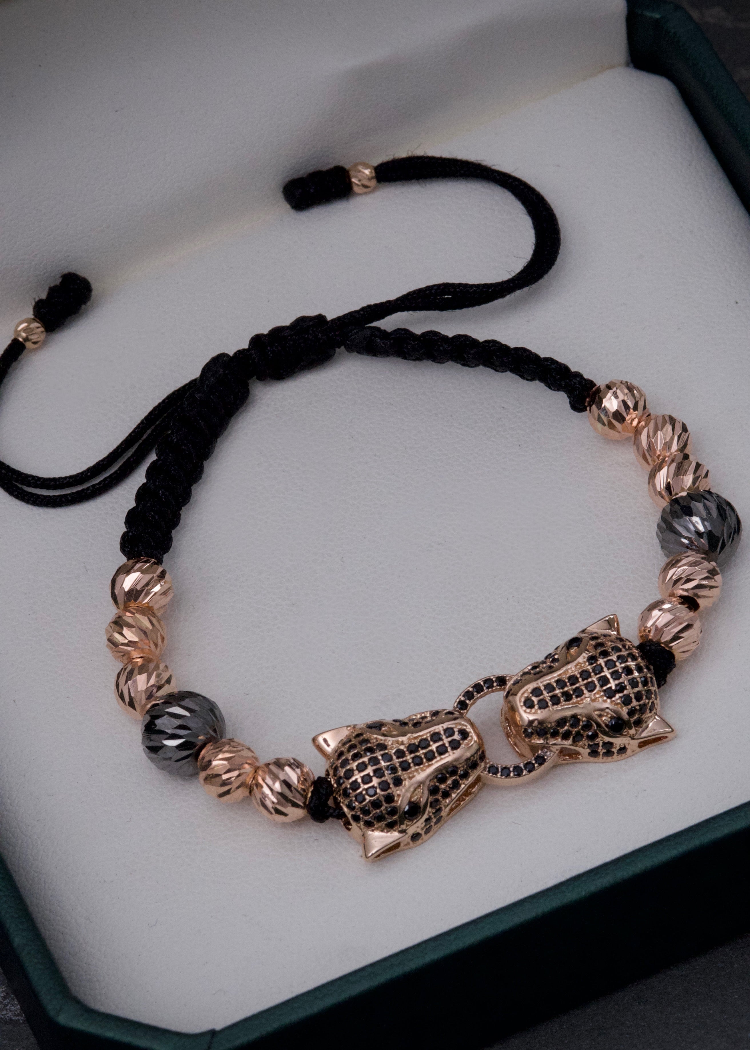 Pulsera en hilo negro con herraje de pantera 8.5gr / Oro Rosado (Joya) M