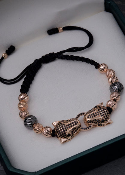 Pulsera en hilo negro con herraje de pantera 8.5gr / Oro Rosado (Joya) M