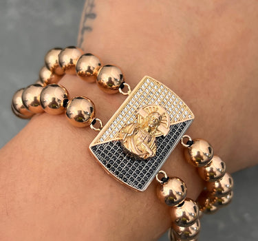 Pulsera en hilo negro con herraje de corazon de jesus 16.2gr / Oro Rosado (Joya) M