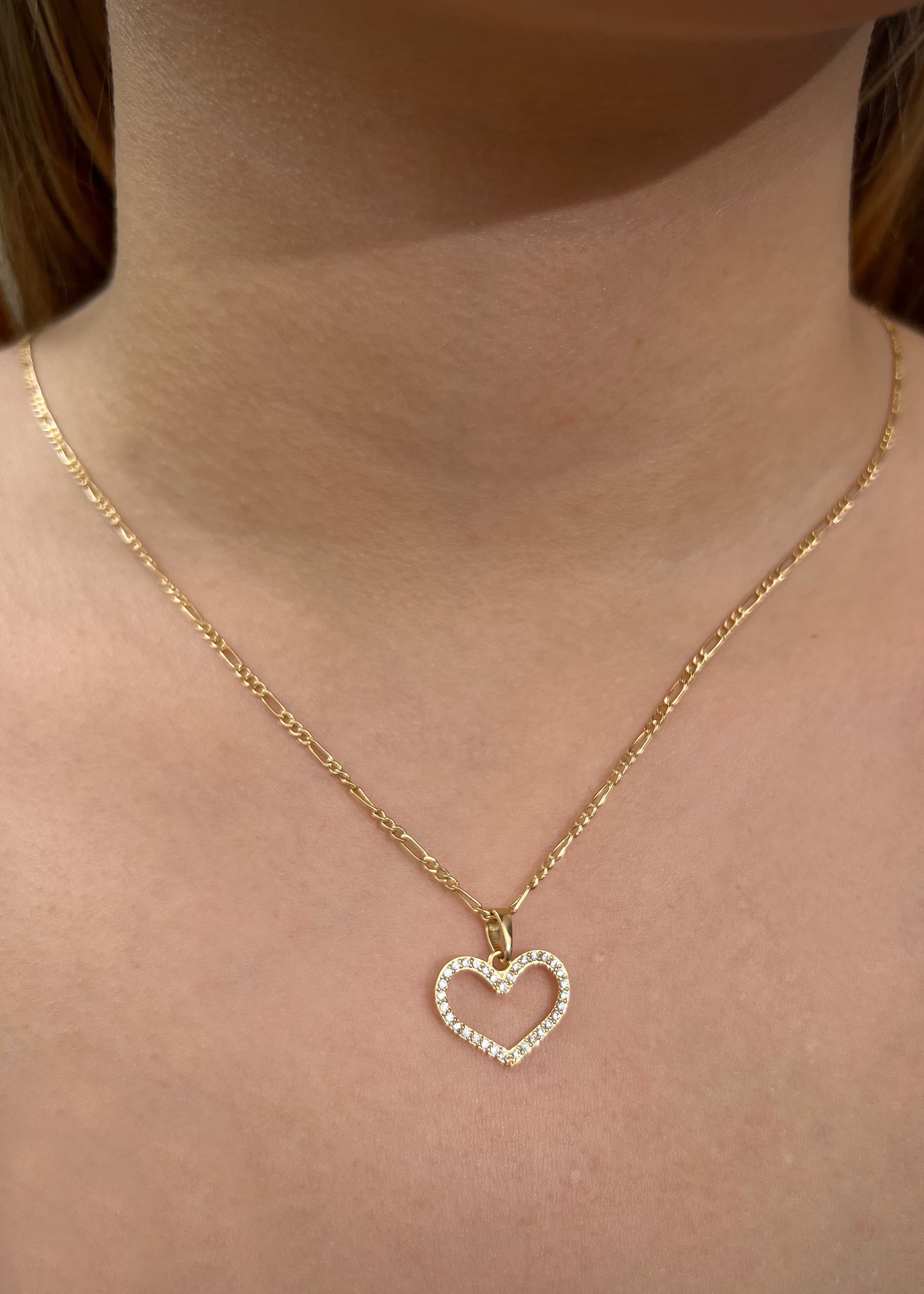 Dije corazon con swarovski blanco 1.1gr / Largo 1.8cm / Oro Amarillo Nac P