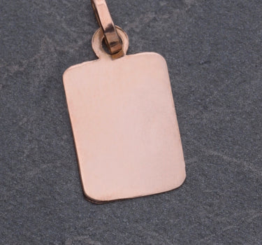 Dije placa 0.55gr / Largo 2.2cm / Oro Rosado Nac B