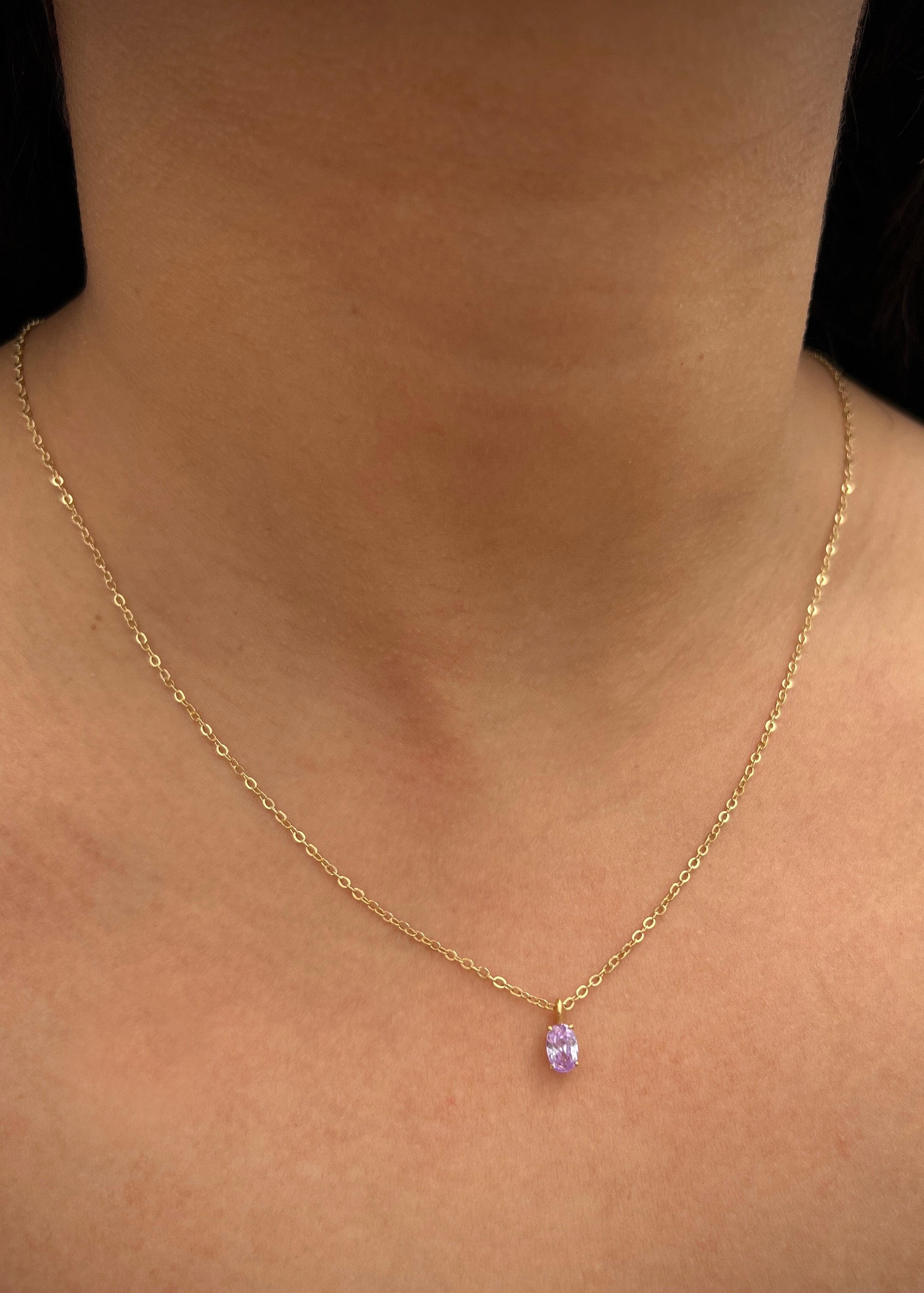 Dije con swarovski Lila 0.4gr / Largo 0.9cm / Oro Amarillo Nac B