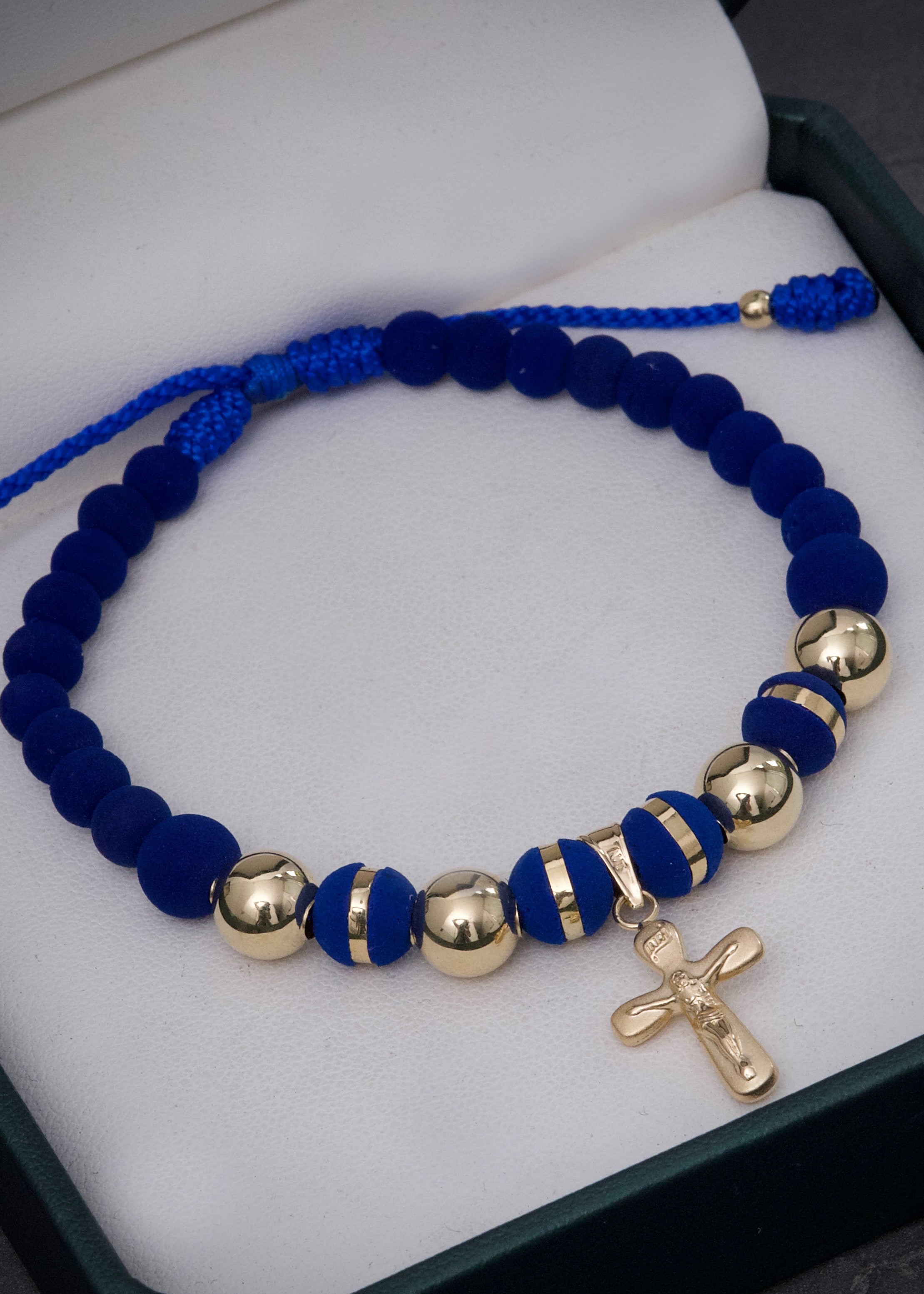 Pulsera en hilo azul con dije de cruz 2.9gr / Oro Amarillo (Joya) M