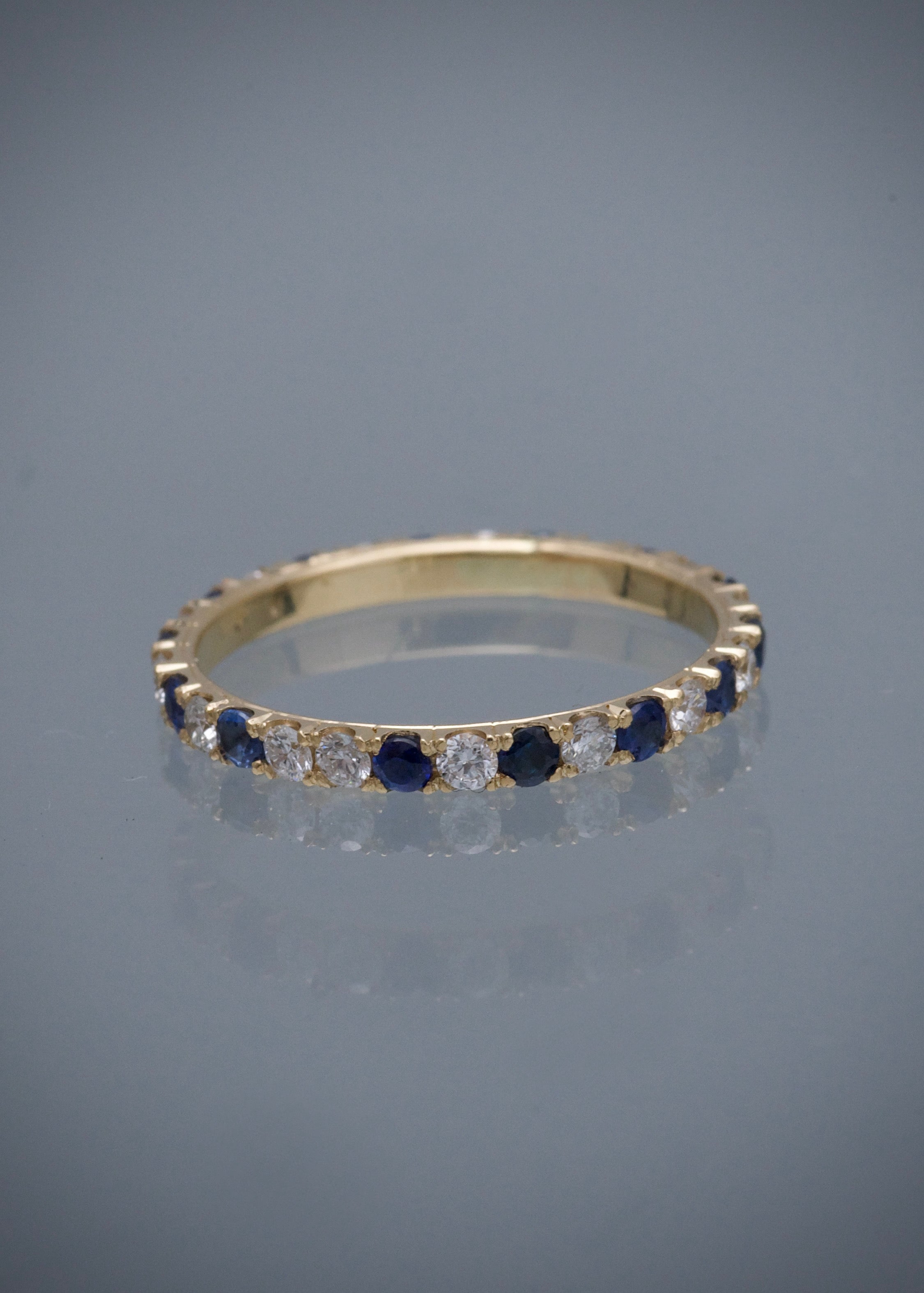 Anillo con 41pts de diamantes y 55pts de zafiro 1.25gr / TALLA 5 3/4 / Oro Amarillo (Joya) M