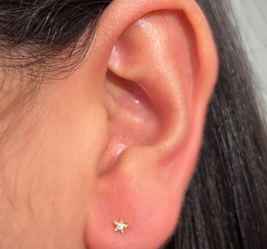Topos estrella con swarovski blanco 0.5gr / Largo 0.33cm / Oro Amarillo Nac M