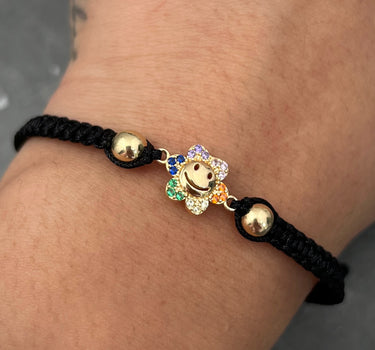 Pulsera en hilo negro con herraje flor 1.25gr / Oro Amarillo (Joya) M