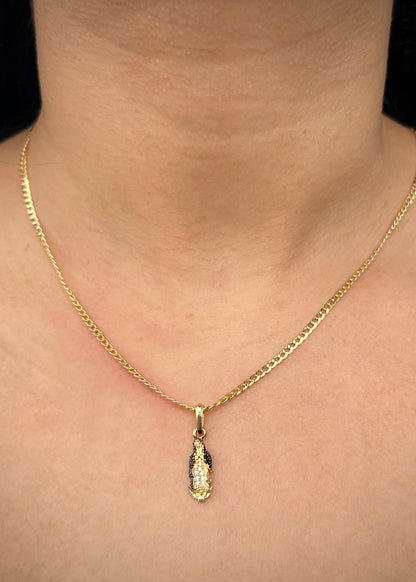 Dije virgen de guadalupe con swarovski negro 1.35gr / Largo 2.4cm / Oro Amarillo Nac M