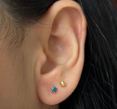 Topos con 21pts de diamante azul 0.55gr / Largo 1 cm / Oro Amarillo Nac (Joya) B