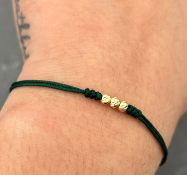 Pulsera en Hilo Verde con bolas diamantadas 3mm 0.15gr / Oro Amarillo (Joya) M