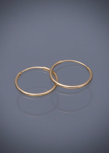 Candongas lisas 0.55gr / Largo 1.4cm / Oro Amarillo Nac M