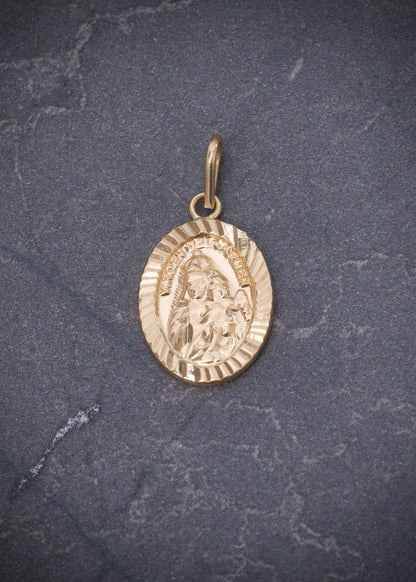 Dije virgen del carmen 0.9gr / Largo 2.2cm / Oro Amarillo Nac M