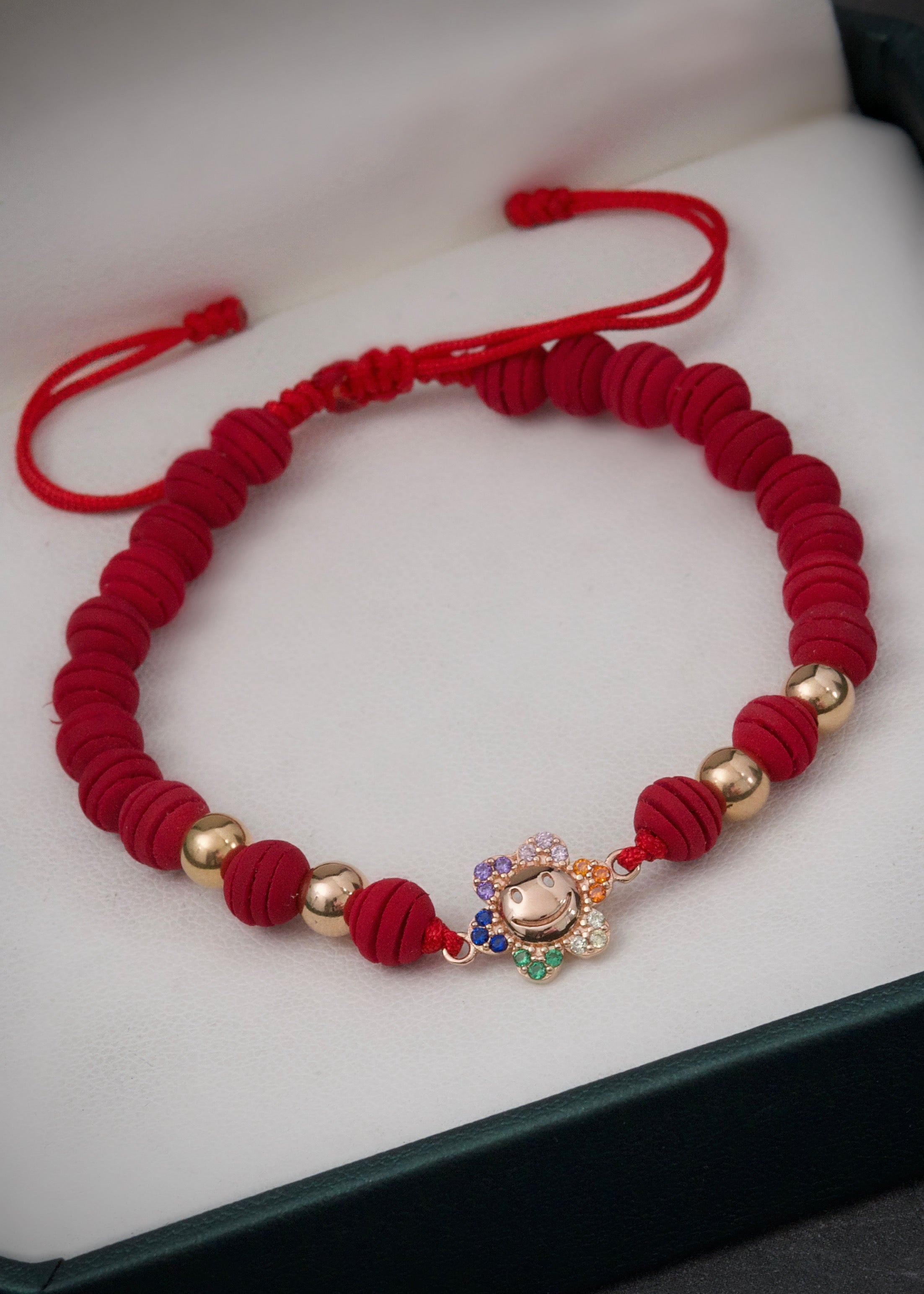 Pulsera en hilo rojo con herraje de flor 1.25gr / Oro Rosado (Joya) M
