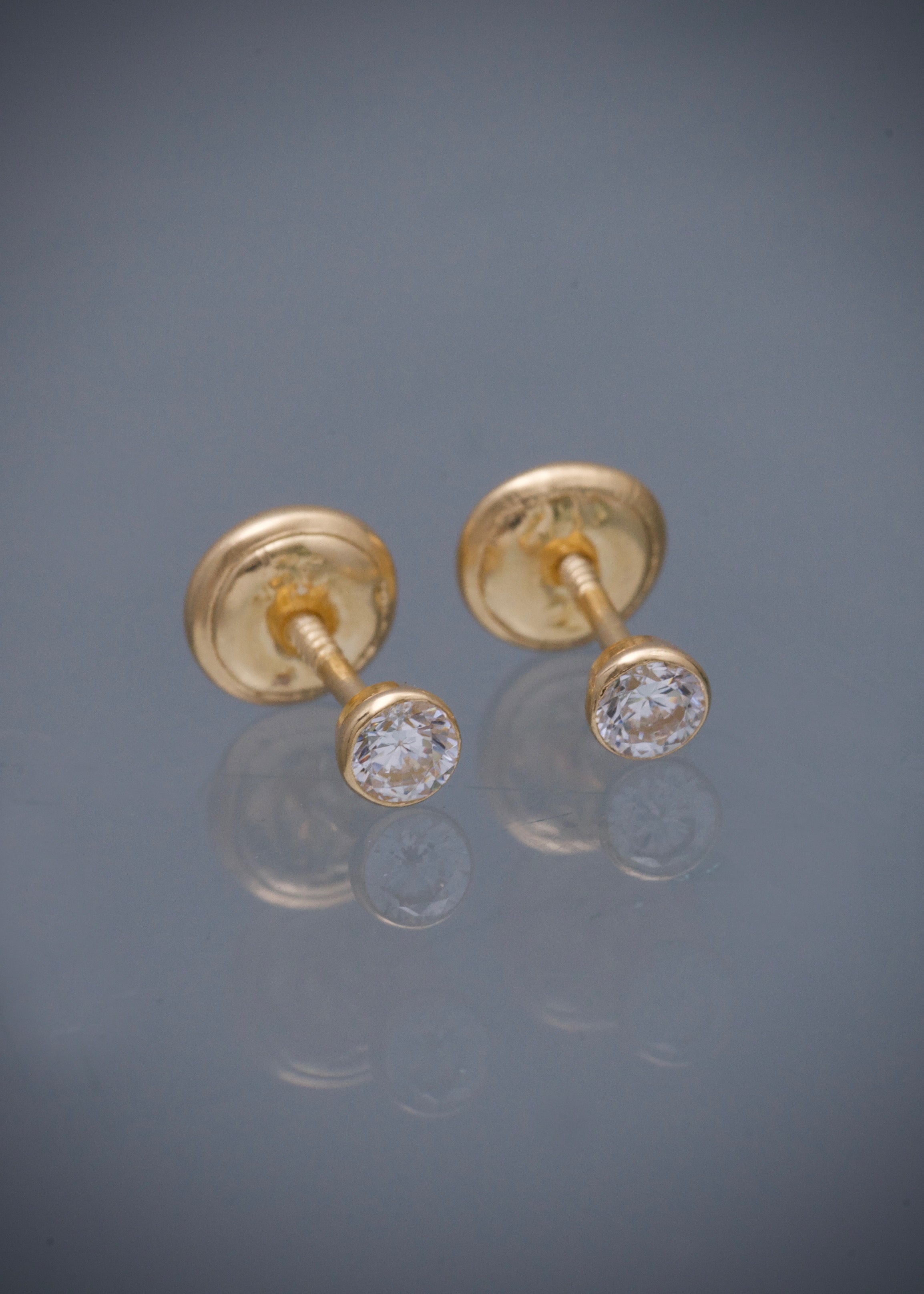 Topos circulo con swarovski blanco 0.55gr / largo 0.32cm / Oro Amarillo Nac M