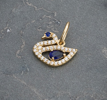 Dije Cisne Con Swarovski Azul Y Blanco 1.1gr / Largo 1.5cm / Oro Amarillo Nac B