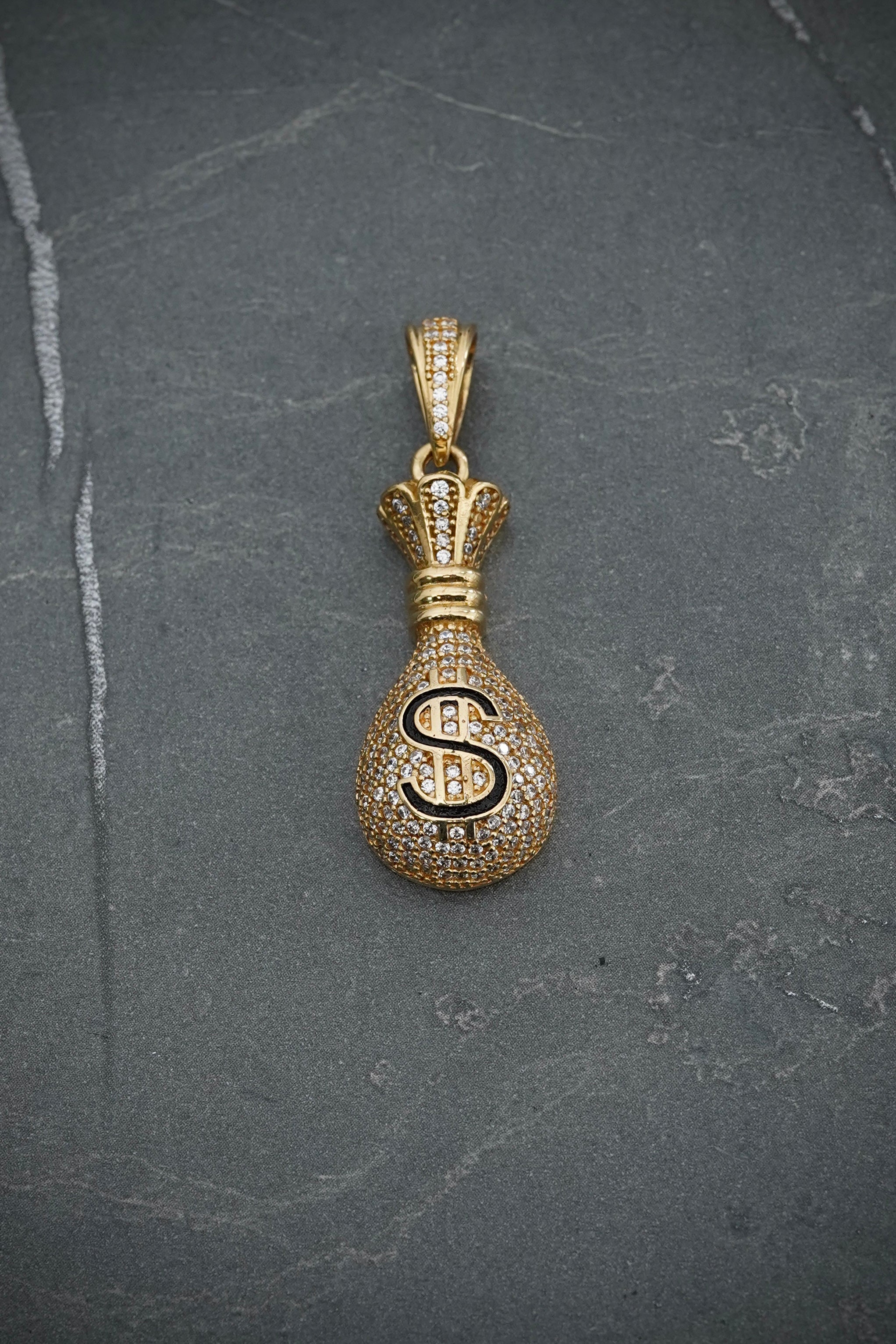 Dije bolsa de dinero con swarovski blanco 8.9gr / Largo 4cm / Oro Amarillo Nac P