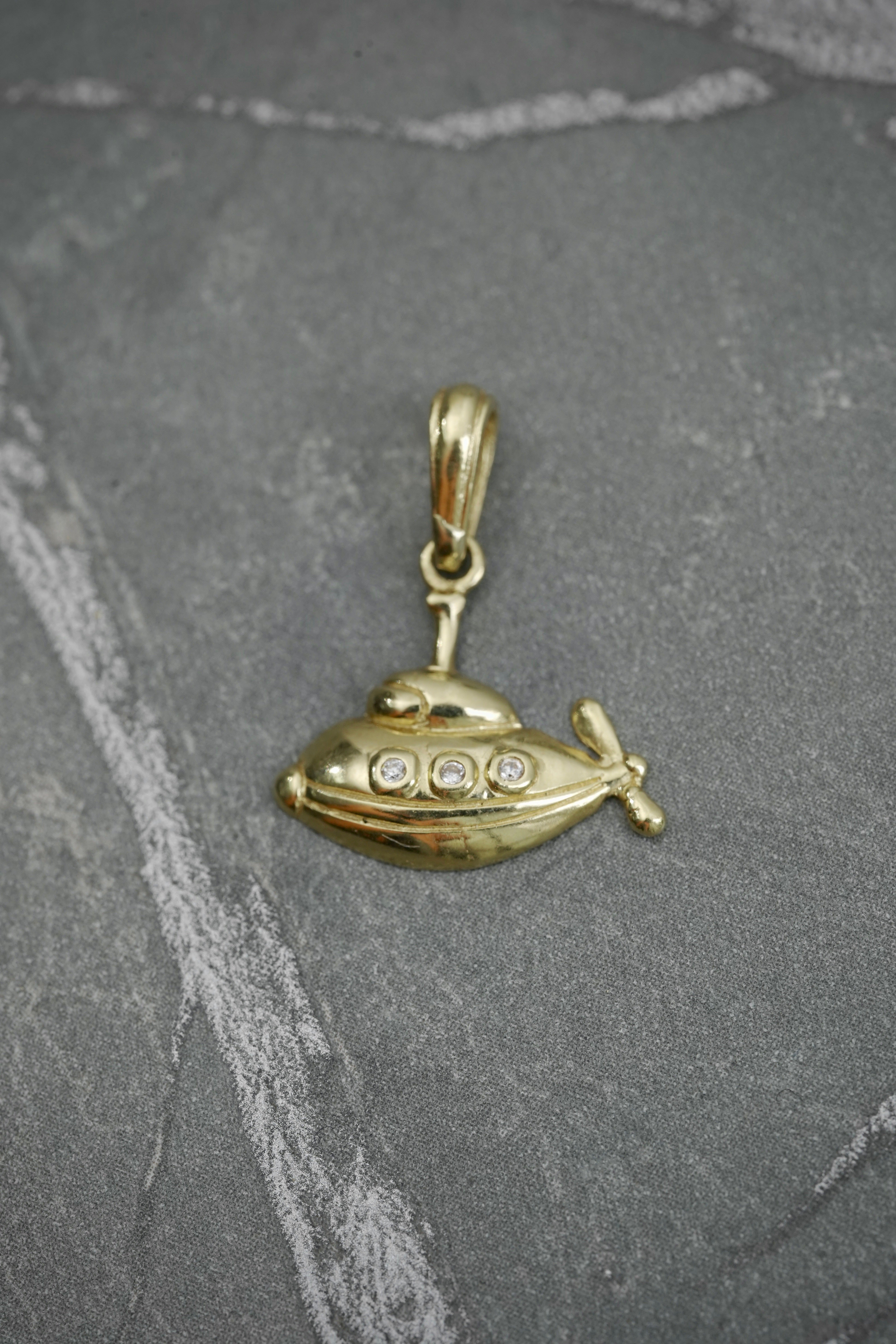 Dije de submarino 1gr / 1.8cm / Oro Amarillo Nac B
