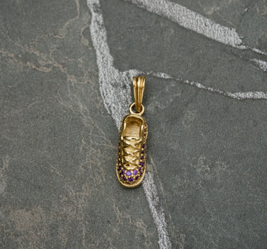 Dije De tennis Con Swarovski Morado 2.6gr / Largo 2.3 cm / Oro Amarillo Nac M