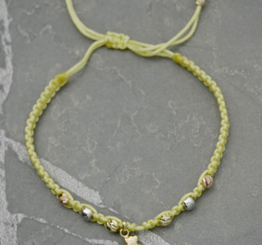 Pulsera en hilo amarillo 1gr / Tres Oros (Joya) M