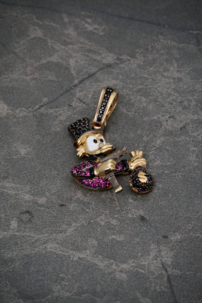 Dije tio rico con swarovski fucsia y negro 6gr / Largo 3.6cm / Oro Amarillo Nac P