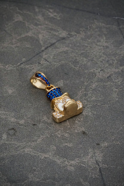 Dije tio rico con swarovski azul y blanco 5.05gr / Largo 2.5cm / Oro Amarillo Nac P