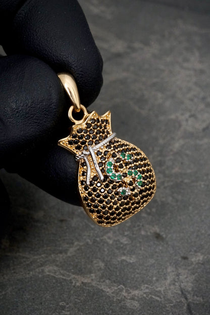 Dije bolsa de dinero con swarovski negro y verde 4.45gr / Largo 3cm / Oro Amarillo Nac P