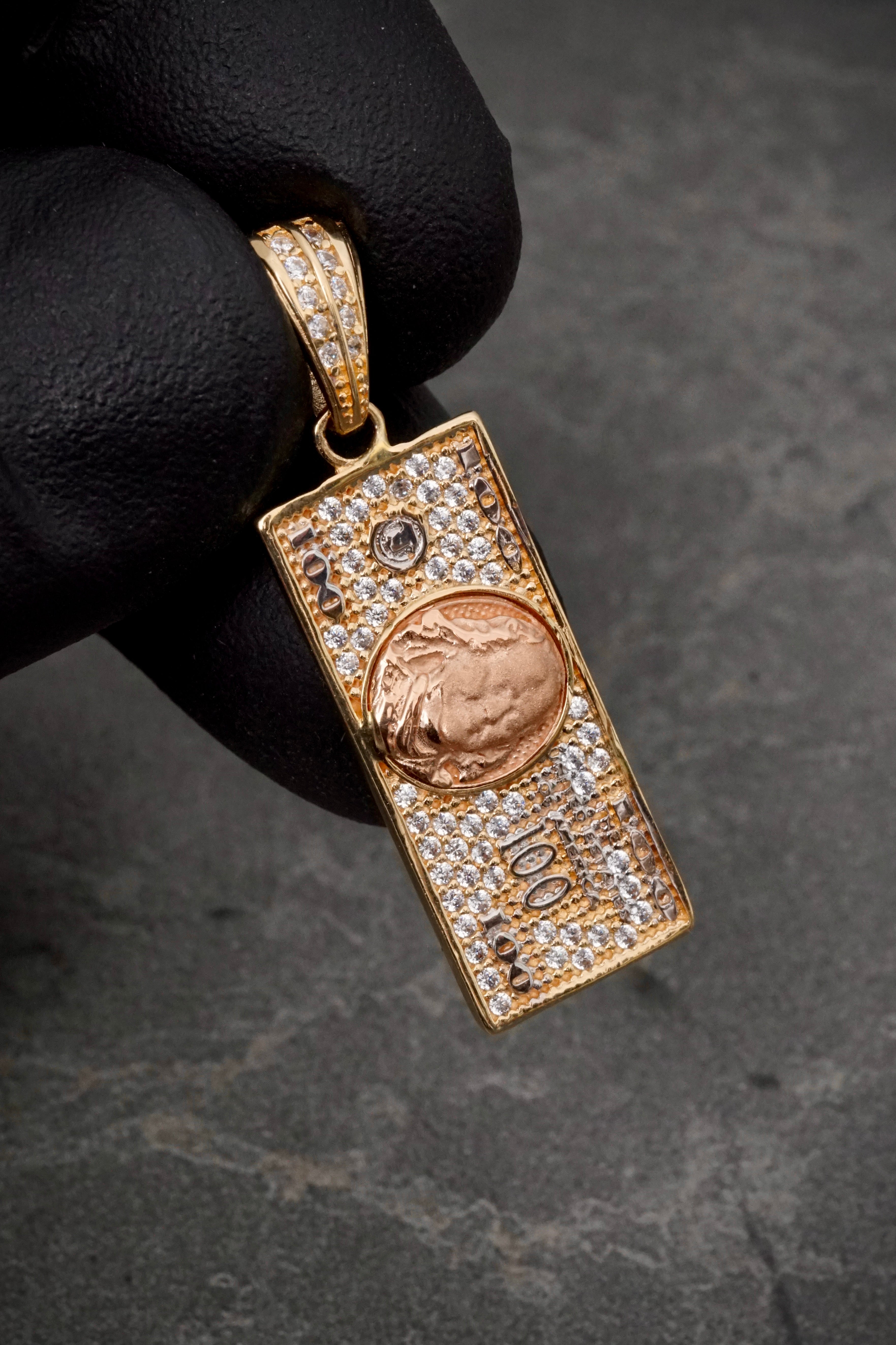 Dije dolar con swarovski blanco 3.45gr / Largo 3.4cm / Dos Oros Nac B