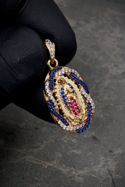 Dije virgen de guadalupe con swarovski azul y fucsia 3.5gr / Largo 3cm / Oro Amarillo Nac B