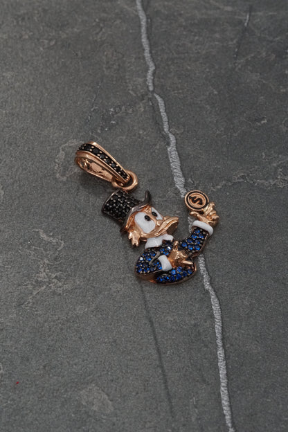 Dije tio rico con swarovski azul y negro 4.75gr / Largo 3.5cm / Oro Rosado Nac M