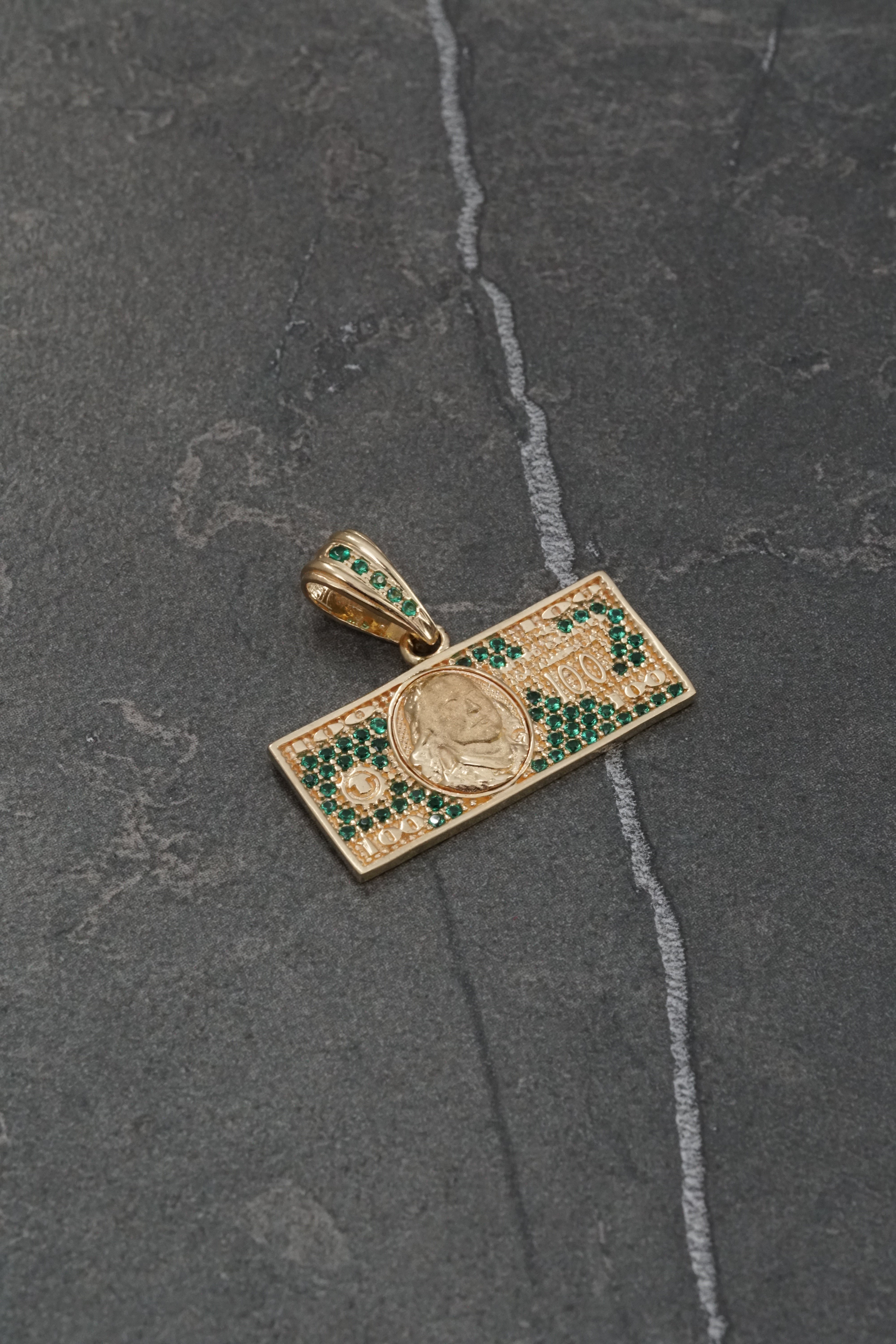 Dije dolar con swarovski verde 3.3gr / Largo 2cm / Oro Amarillo Nac M