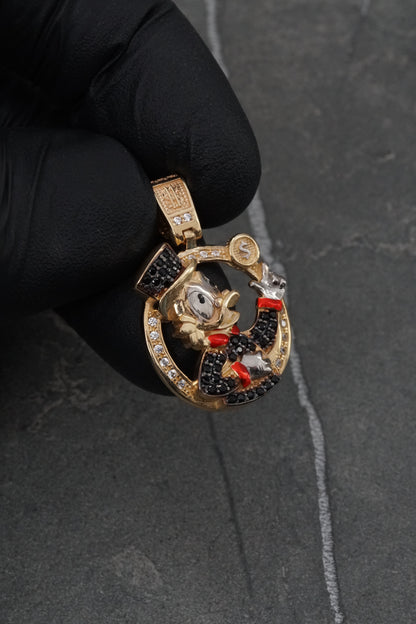 Dije tio rico con swarovski negro y blanco 4.7gr / Largo 2.8cm / Oro Amarillo Nac B