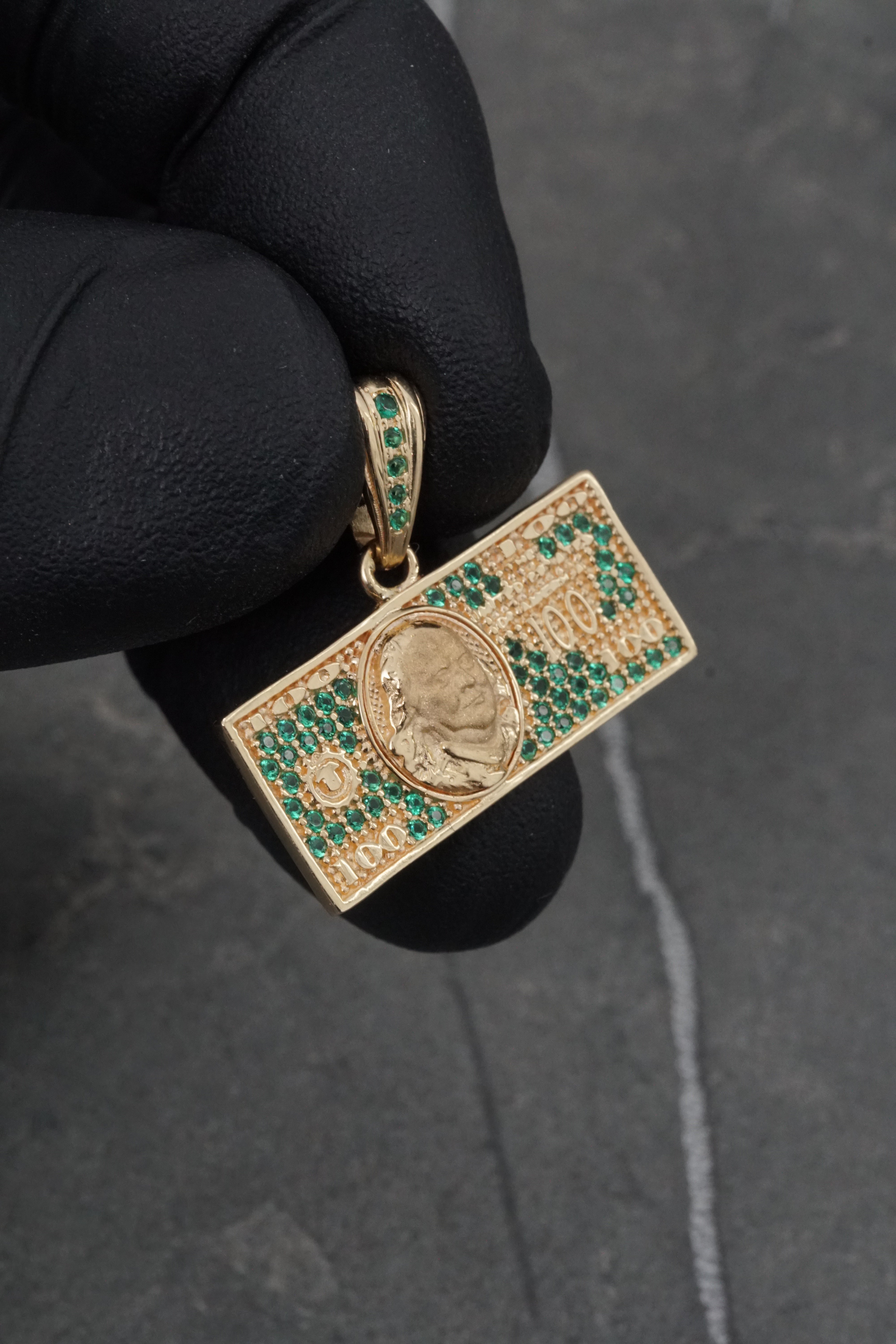 Dije dolar con swarovski verde 3.3gr / Largo 2cm / Oro Amarillo Nac M