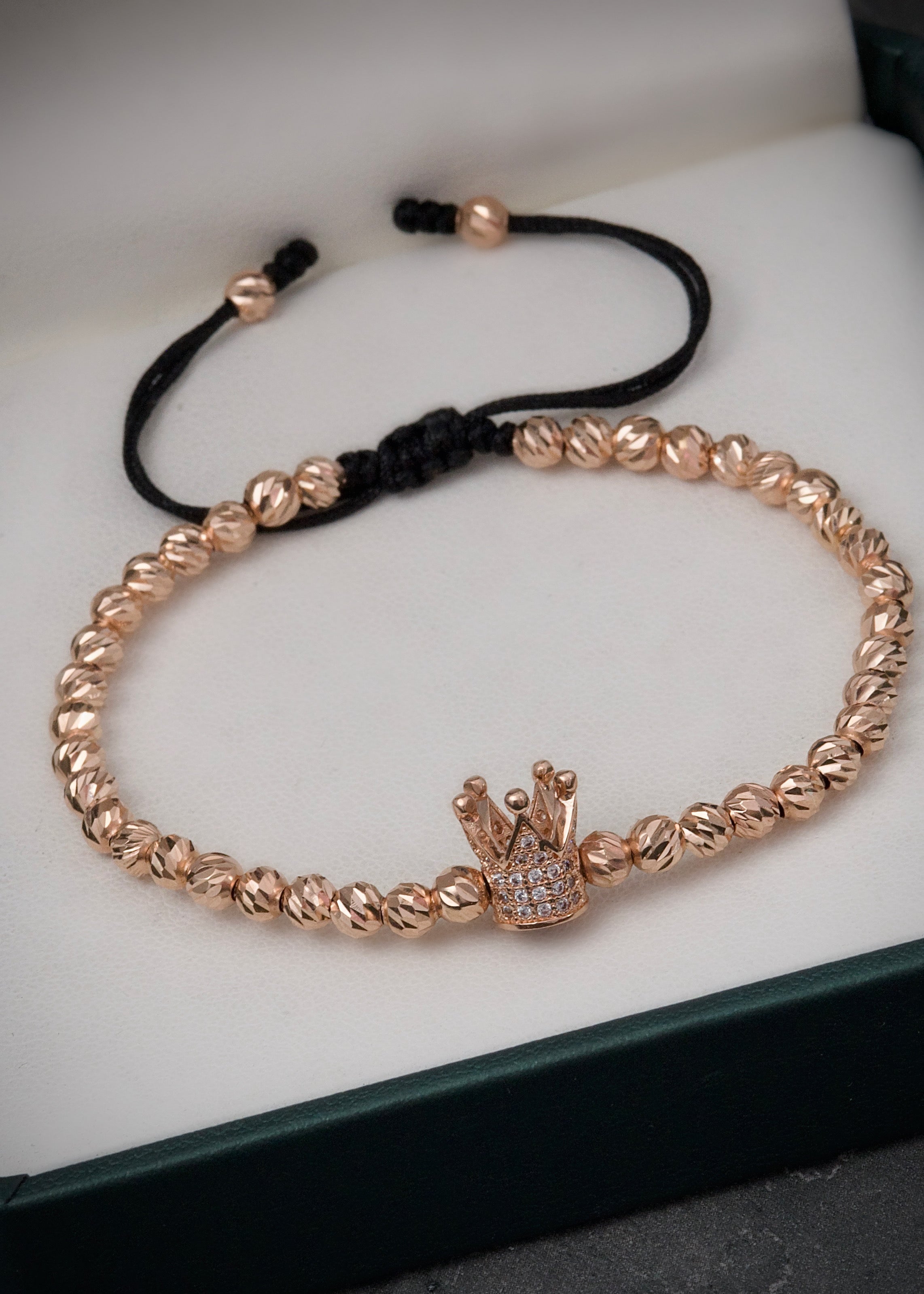 Pulsera en hilo negro con herraje corona 5.6gr / Oro Rosado (Joya) M