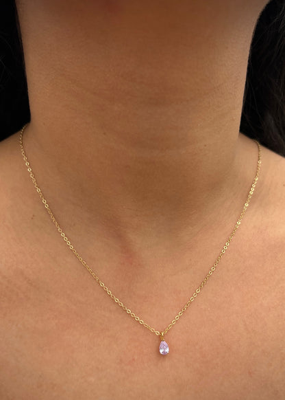 Dije con swarovski lila 0.4gr / Largo 0.9cm / Oro Amarillo Nac B