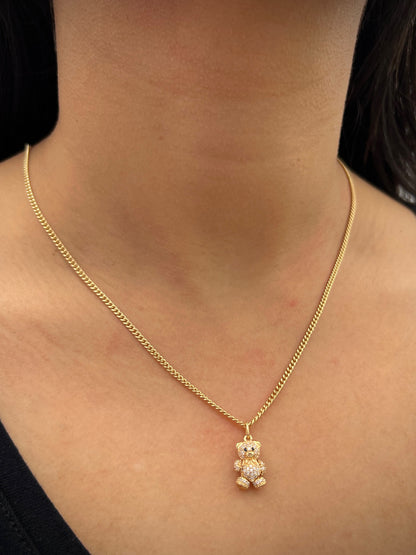 Dije oso articulado con swarovski blanco 2.6gr / Largo 1.9cm / Oro Amarillo Nac B
