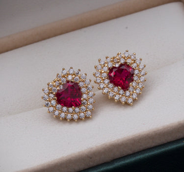 Topos de corazon con swarovski fucsia y blanco 4gr / Largo 1 cm / Oro Amarillo Nac P