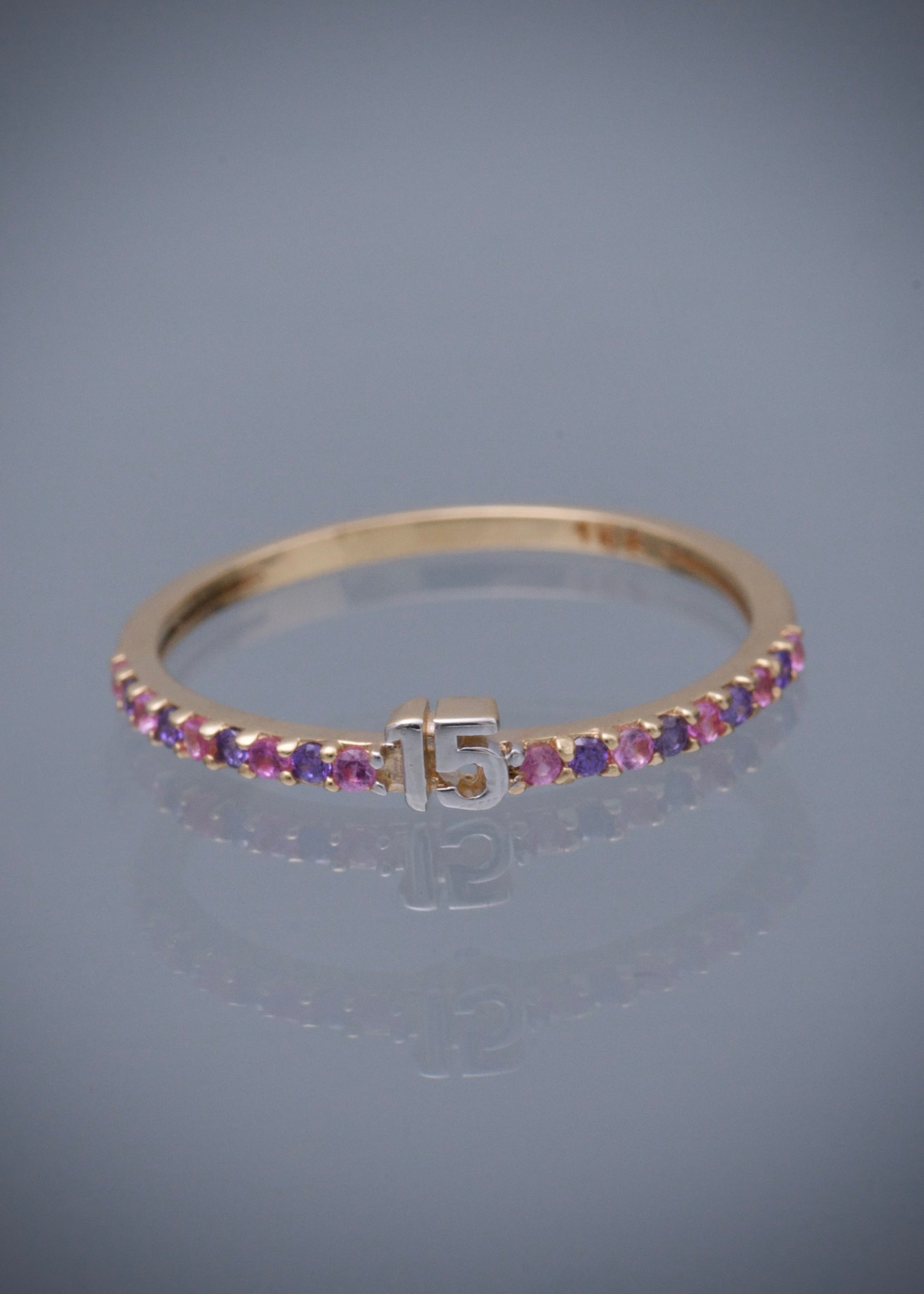 Anillo de 15s con swarovski rosado y morado 1.4gr / TALLA 7 1/4 / Oro Amarillo Nac B