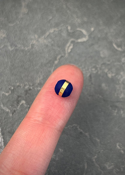 Neoro azul 6mm 1 Raya 0.06gr / Oro Amarillo Nac B