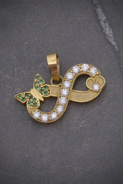 Dije de infinito con moissanitas blancas 0.38qts (38pts) 3.1gr / Oro Amarillo (Joya) P