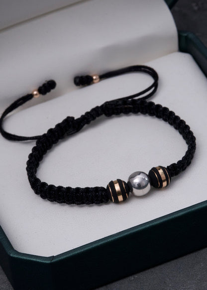 Pulsera en hilo negro con bolas lisas 0.35gr / Dos Oros (Joya) *