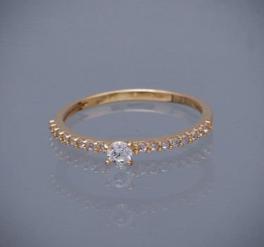 Solitario con swarovski blancos 1.65gr / Talla: 7 / Oro Amarillo Nac B