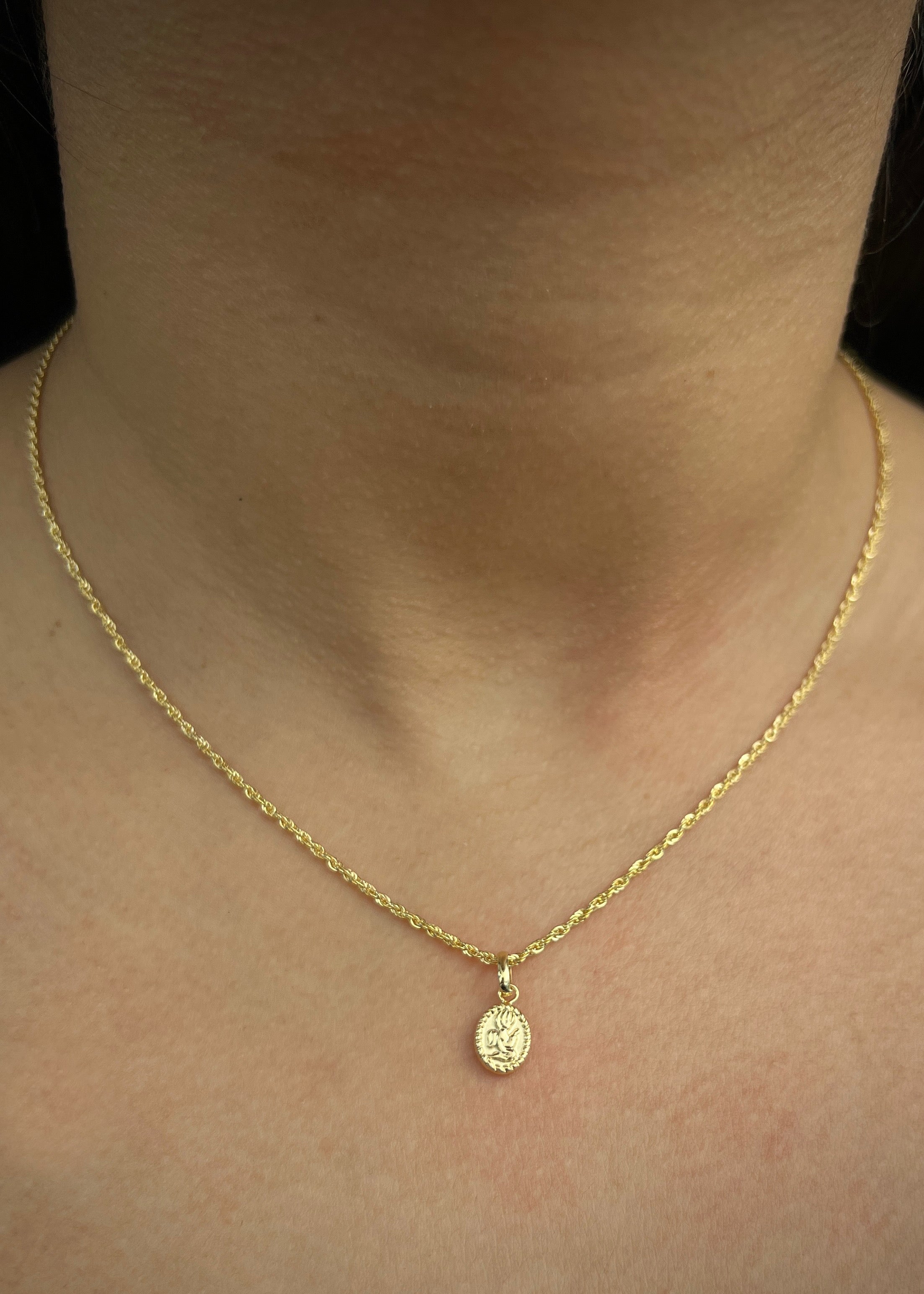 Dije angel de la guarda 0.35gr / Largo 1.5cm / Oro Amarillo Nac P